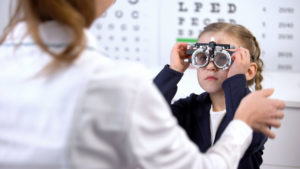 young child at eye doctor