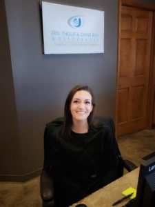 female worker behind desk