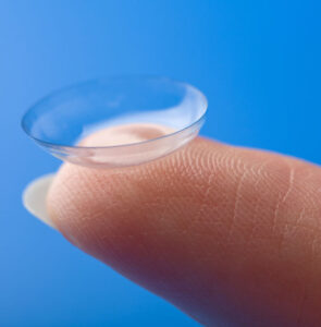 closeup of contact lens on a finger